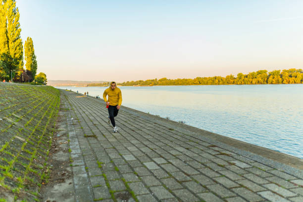 istock Athlete Jogging Near the River 1124593616