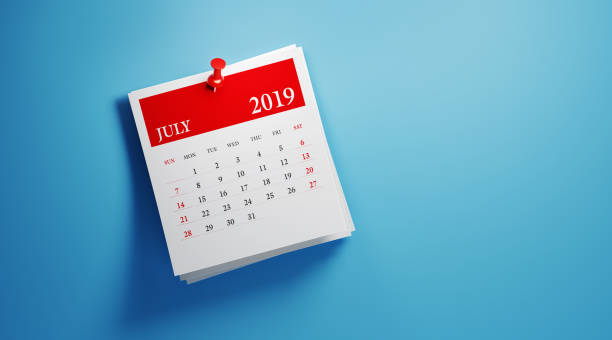 istock Post It July 2019 Calendar On Blue Background 1124593803