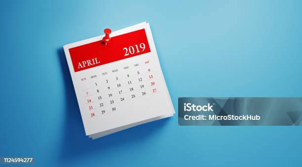 Post It April 2019 Calendar On Blue Background Stock Photo - Download Image Now - Personal Organizer, 2019, Adhesive Note