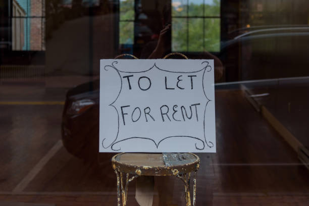istock Small business store front for rent sign in window 1124596351