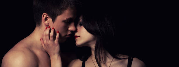 istock Young couple hugging and kissing 1124598214