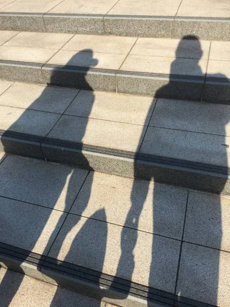 istock Shadow maker of three people 1124604386