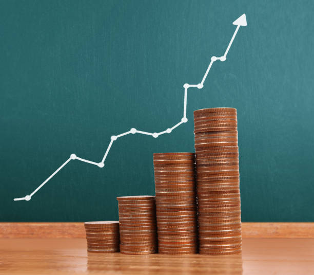 istock graph coins stock finance  business concept 1124605376