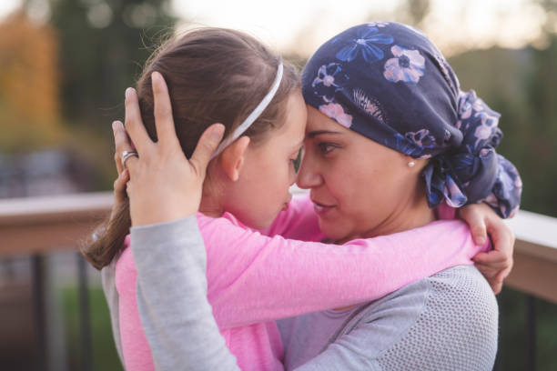 istock Mother with cancer hugging her daughter 1124605503