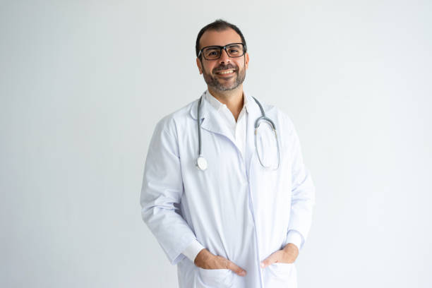 istock Smiling handsome male doctor posing at camera 1124606243