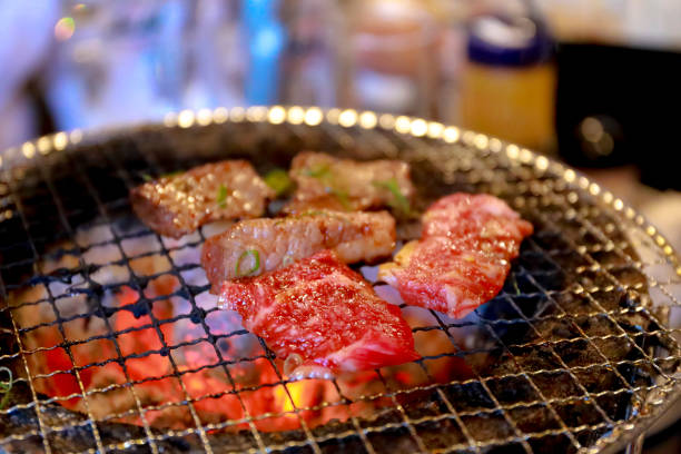 istock Japanese grilled meat over charcoal on stove 1124610611