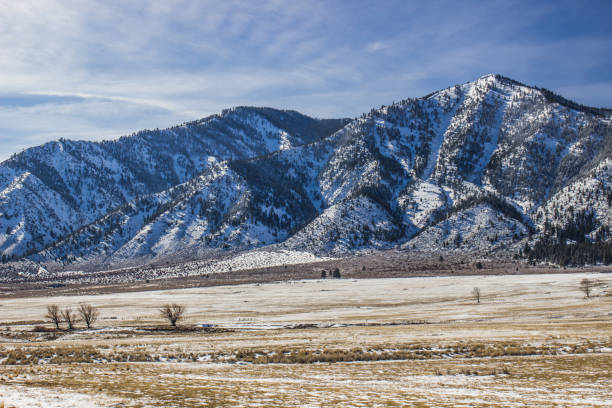 istock Open Plain At Base Of Mountains In Winter 1124612891