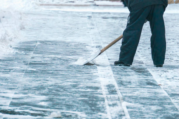 istock city service cleaning streets from snow with special tools after snowfall d 1124615213