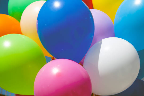 istock bright, colorful balls, against the blue sky 1124619754
