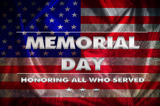 Celebration of all who served. American flag with the text Memorial day, background is  fireworks .