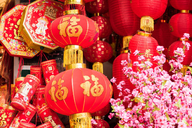 istock peach flowers, red Chinese lanterns and traditional ornaments (Chinese New Year or Spring Festival concept).( the Chinese characters on it which mean 
