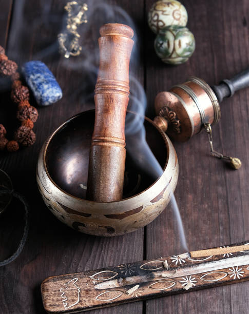 istock copper singing bowl and a wooden stick 1124625259