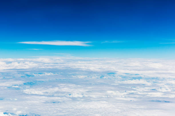 istock Blue sky with white cloud background,  and air plane wing. 1124626283