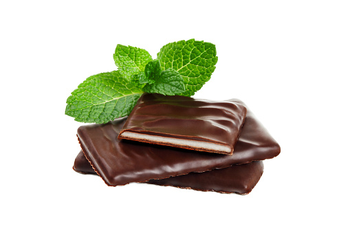 Peppermint chocolate bar with mint leaf isolated on white background