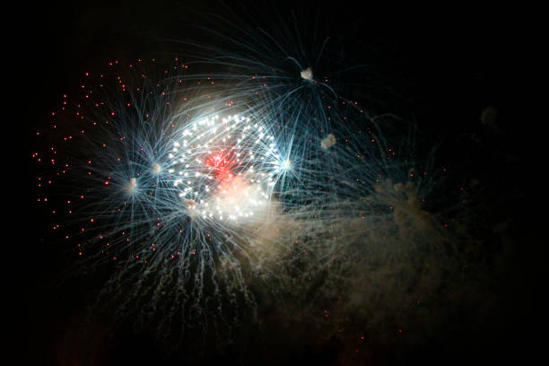 istock Celebrating firework in the black night sky 1124627300
