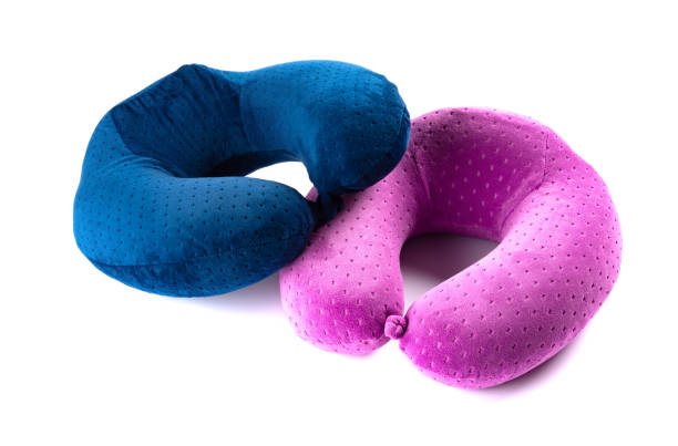 istock blue and purple comfortable neck pillows on white background 1124629003