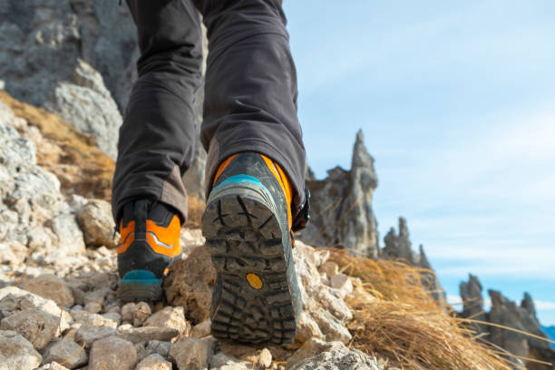istock Hiking boots on the mountain trail 1124629106