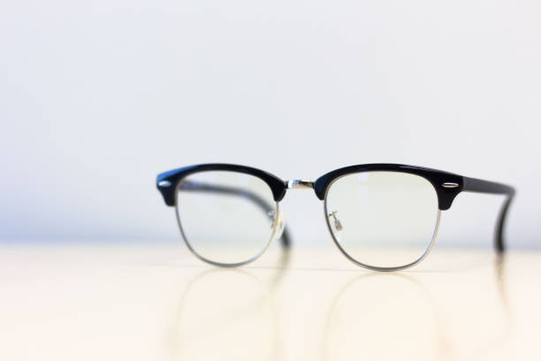 istock Close up side view  glasses on  desk table 1124630098