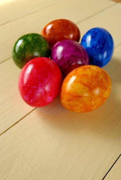 istock Easter holiday.Colorful Easter Eggs on Yellow Board Background.Spring season 1124631914