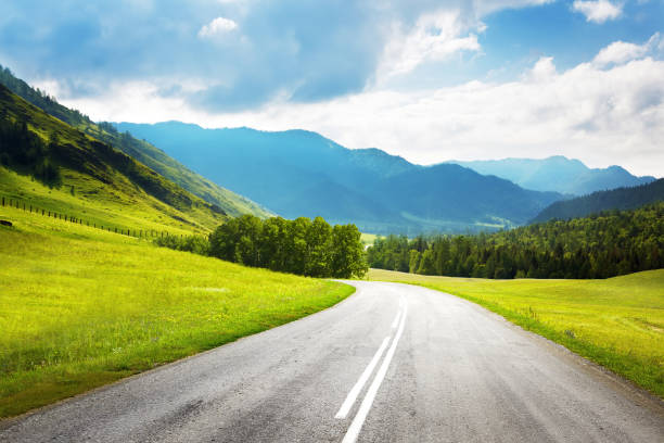 istock Winding mountain road without cars 1124635818