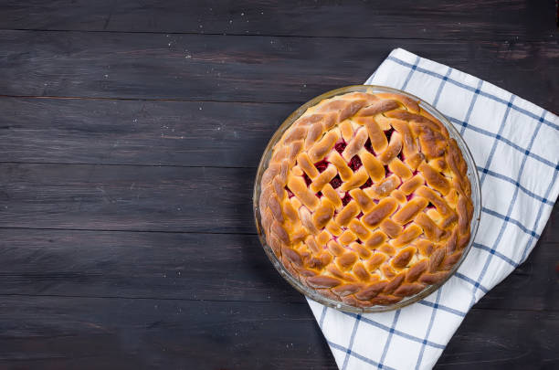 istock cherry Pie in a glass round form, yeast cake 1124637042