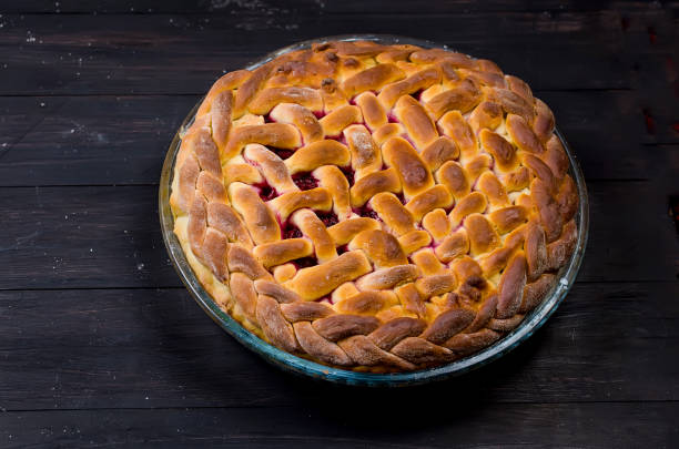 istock cherry Pie in a glass round form, yeast cake 1124637215