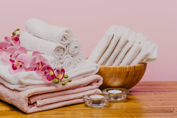 istock Spa still life with aromatic candles,orchid flower and towel. - Image 1124638449