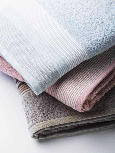 istock Pastel color clean folded towels on white 1124638720