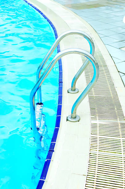 istock Grab bars ladder in the swimming pool 1124641057