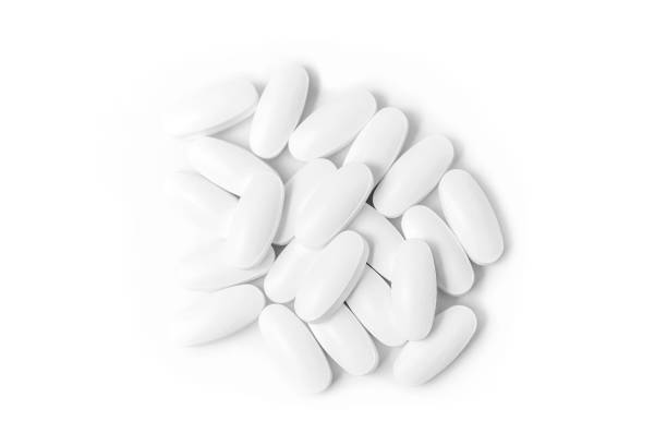 istock heap of white medicine tablets 1124641532