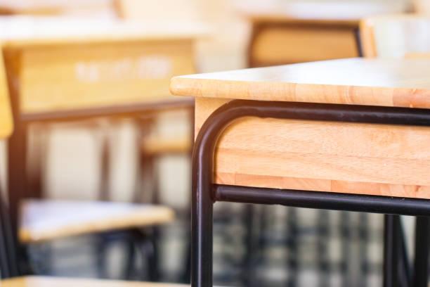 istock Back to school concept. School empty classroom, Lecture room with desks and chairs iron wood for studying lessons in highschool thailand without young student, interior of secondary education 1124642189