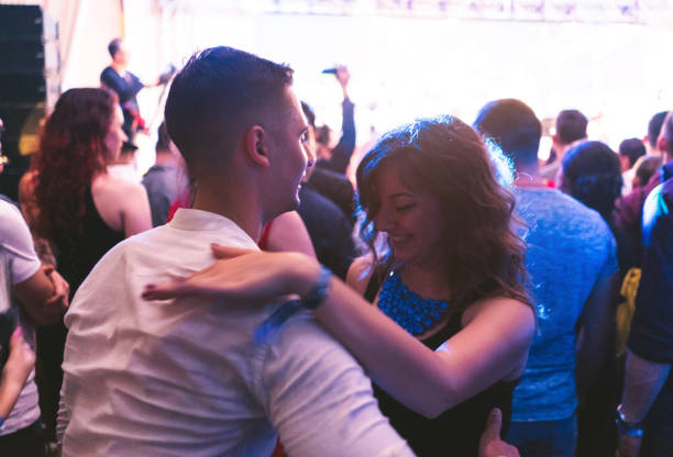 istock Couple dancing at an open air concert 1124643865