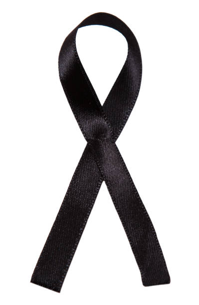 istock Black ribbon isolated on white background 1124645105