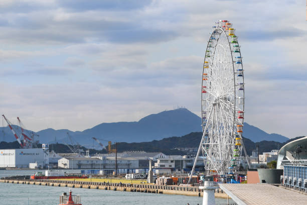 Shimonoseki, Japan - November 23, 2018: Ferris wheel is seen from Karato market, Shimonoseki, Japan