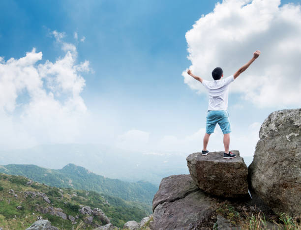 istock Man on the top of mountain 1124645483