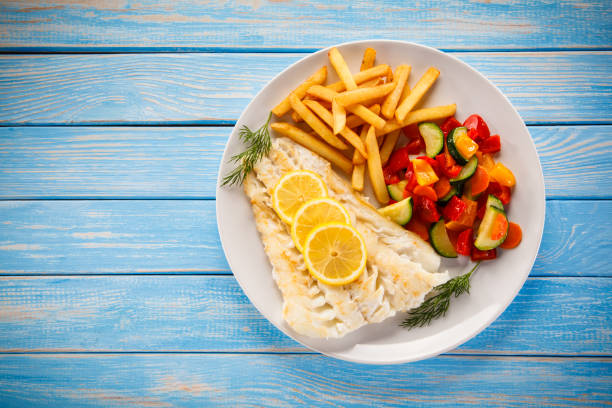 filetes de bacalhau assado e legumes - squash fried deep fried dill - fotografias e filmes do acervo