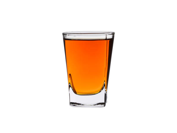trinkglas von whisky und brandy isoliert auf weißem hintergrund - shot glass stock-fotos und bilder