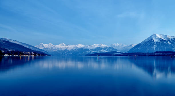озеро йеневское ночью, швейцария - dramatic sky european alps mountain europe стоковые фото и изображения