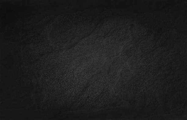 istock Dark grey black slate texture in natural pattern with high resolution for background and design art work. Black stone wall. 1124646757