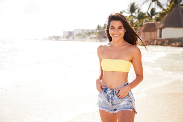 istock Stunning girl on beach 1124647685