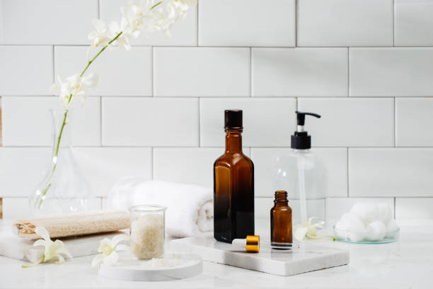 istock Bottles with massage essentials oils, towels. Spa composition. 1124649826