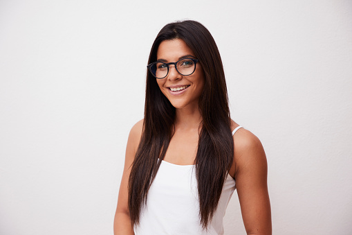 Smiling beautiful woman in glasses, portrait