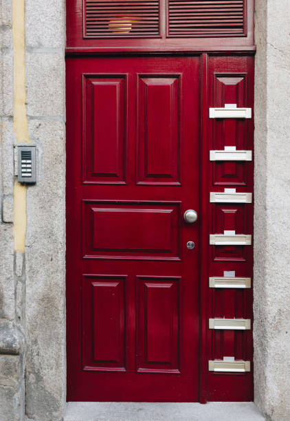 istock Letterboxes on red wooden door 1124653280
