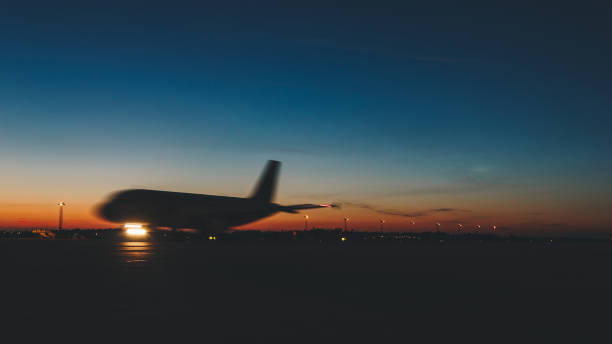 istock Passenger jet plane against beautiful dusky sky 1124653339
