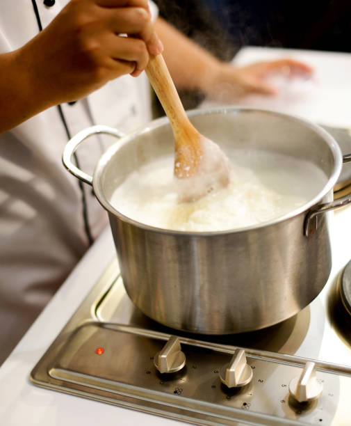 istock Chef cooking food in the kitchen, Chef preparing food 1124653347