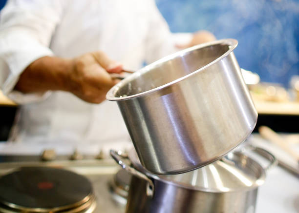 istock Chef cooking food in the kitchen, Chef preparing food 1124653351