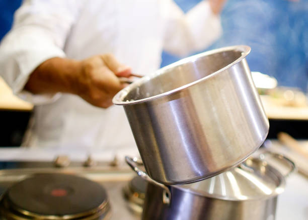 istock Chef cooking food in the kitchen, Chef preparing food 1124653369