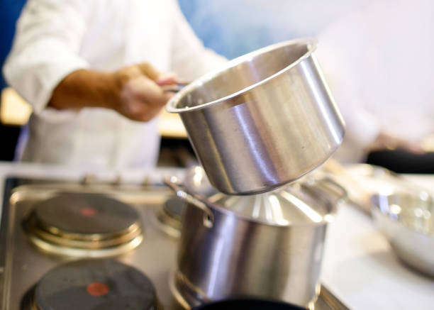 istock Chef cooking food in the kitchen, Chef preparing food 1124653371