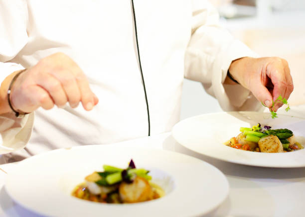 istock Chef cooking food in the kitchen, Chef preparing food 1124653406