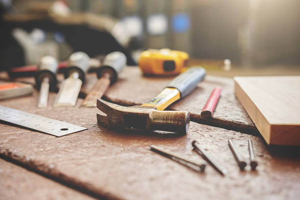 istock Euipment on wooden desk with workshop background. 1124654017